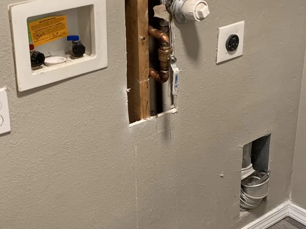 Washing machine outlet box roughed in with new copper water lines