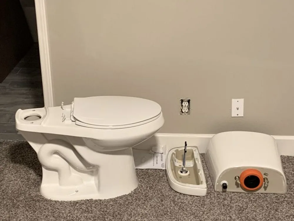 Newly installed toilet in a finished bathroom